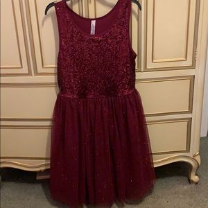 Knee length red sparkly dress